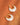 Roselle 18K Gold Non-Tarnish Teardrop Hoop Earrings displayed on a textured orange background.