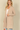 Shop Wall beige long sleeve open front cardigan with side pockets worn by a blonde model against a neutral background