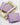 Organic Love Purple Handmade Soap in a wooden basket with decorative leaf designs.