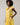 Joni Floral Yodi Shift Mini Dress featuring short ruffle sleeves, a split neckline, and tiered skirt in yellow floral print.