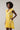 Joni Floral Yodi Shift Mini Dress featuring short ruffle sleeves, a split neckline, and tiered skirt in yellow floral print.