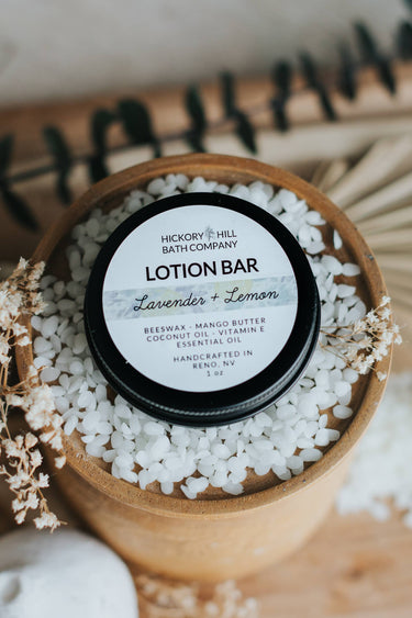 Lavender Lemon Beeswax Lotion Bar in round packaging