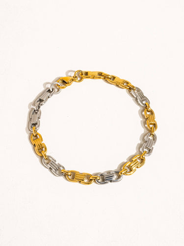 Calliope 18K Non-Tarnish Silver Gold Chain Bracelet featuring a stylish chain design in gold and silver.
