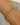 Calliope 18K Non-Tarnish Silver Gold Chain Bracelet worn on wrist, showcasing a mix of silver and gold links.