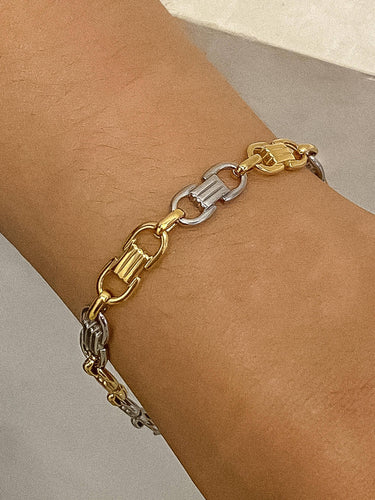 Calliope 18K Non-Tarnish Silver Gold Chain Bracelet worn on wrist, showcasing a mix of silver and gold links.
