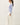 Side view of model wearing light blue Ultra Soft Boatneck Basic Long Sleeve Top