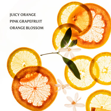 Citrus Grove Power Mist Hydrating Hand Sanitizer with fresh citrus slices