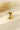 Large gold ring with white natural stone
