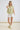 Light green collared V neck button down line lace detail shirt with white shorts