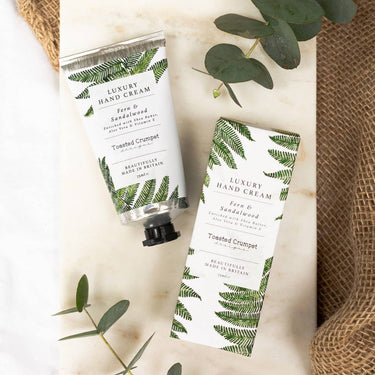 Fern and Sandalwood hand cream in a decorative box, showcasing luxury moisturizing hand care made in Britain.
