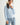 Pearl Button Ribbed Knit Cardigan styled in a light blue color variant