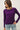 Front view of model wearing purple Ultra Soft Boatneck Basic Long Sleeve Top with blue jeans