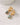 The Classic Form Labradorite Huggie Hoops featuring gold-plated design and faceted labradorite stones.