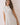 Classic Shirt Collar Neck Pleated Detail Dress model showcasing the shirt-collar neckline and pleated detail.