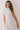 Classic Shirt Collar Neck Pleated Detail Dress model showcasing the shirt-collar neckline and pleated detail.