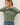 Model wearing green Ultra Soft Basic Button Up Cardigan with blue jeans