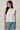 crew neck sleeveless diagonal panel stripe top front view on model