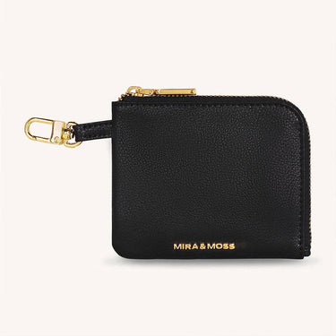 Mira & Moss Nova Compact Wallet in black vegan leather with gold-tone hardware and zip compartment.