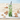 Clovers St. Patrick's Day Tumbler Shamrock Tumbler surrounded by seashells on a beach.