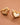 18K Gold Plated Waterproof Stainless Steel Stud Earrings 7912 displayed as a pair on a peach background