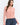 Pearl Button Ribbed Knit Cardigan styled with denim shorts for a casual look