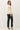 Back view of model wearing cream raglan sleeve pullover sweater