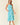 Two Tone Floral Button-Down Bodice Midi Dress showcasing a model in a blue floral design with adjustable straps and side pockets.