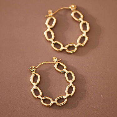 18K Gold Plated Waterproof Stainless Steel Hoop Earrings 7659 displayed on a brown background
