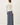 Back view of model wearing white Ultra Soft Essential Basic Crewneck Button Up Cardigan