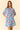 Floral Printed Split V-Neck Half Bell Sleeve Dress displayed on a model, showcasing vibrant floral patterns and ruffle details.