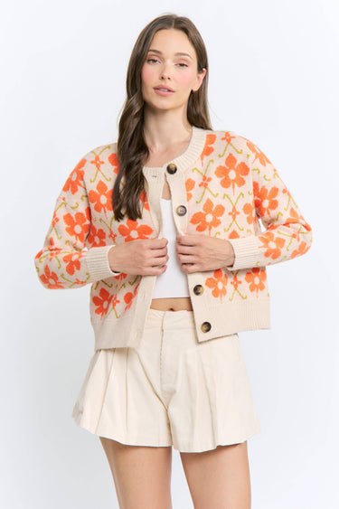 Model wearing CW10437D floral button-up cardigan, full length view