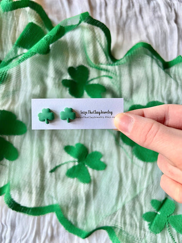 Shamrock Clay Studs Shamrock Stud Earrings displayed with a green shamrock scarf.