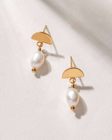 Ethereal Dainty Post Earrings featuring white pearls and gold half-moon posts, stylish and classic accessory.