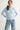 Pearl Button Ribbed Knit Cardigan styled with casual blue jeans