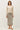 Ribbed Button Up Cardigan front view with patterned skirt