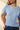 Close-up view of model wearing blue Round Neck Puff Short Sleeve Cable Sweater