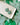 Two Tone Shamrock Earrings Clover Clay Earrings displayed on a tray with green fabric in the background.