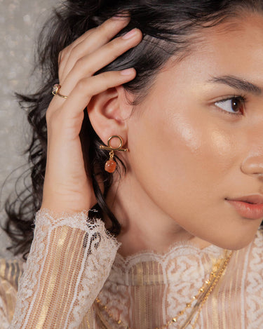 Model wearing Embrace Me Post Earrings - Sunstone