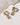 The Classic Form Labradorite Huggie Hoops featuring faceted labradorite stones in gold plated brass.