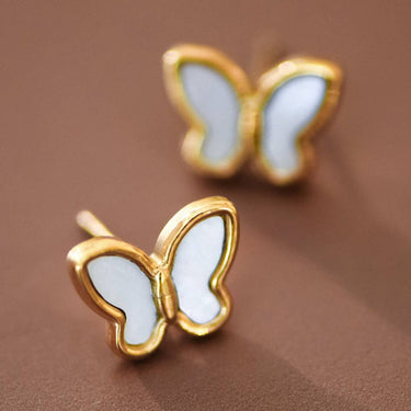 18K Gold Plated Waterproof Stainless Steel Stud Earrings 7623 displayed as a pair on a brown background