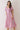 Pink Tropical Print Puff Sleeve Midi Dress featuring a V-neckline and puff sleeves in a tropical leaf pattern.
