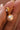 18K Gold PVD Plated Waterproof Stainless Steel Drop Earrings 7774 displayed vertically on a neutral background