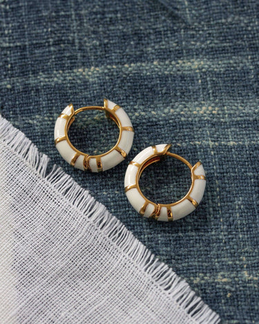 Classic ivory huggie hoop earring front view