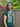 Emerald Green Jamawar Pashmina draped over shoulder