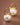 18K Gold PVD Plated Stainless Steel Pearl Drop Earrings 8036 displayed as a pair on a brown background