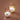 18K Gold PVD Plated Stainless Steel Pearl Drop Earrings 8036 displayed as a pair on a brown background