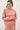 Model wearing pink cotton modal fleece sweatshirt, front view