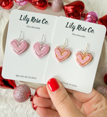 Hearts with Gold and Silver Foil Earrings displayed on cards, featuring pink handcrafted polymer clay designs.