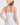 Floral Print Pleated Fit & Flare With Embroidery shown from the back with a straw hat