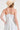 Floral Print Pleated Fit & Flare With Embroidery shown from the back with a straw hat